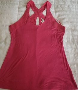 Pink sleeveless blouse w/criss cross back